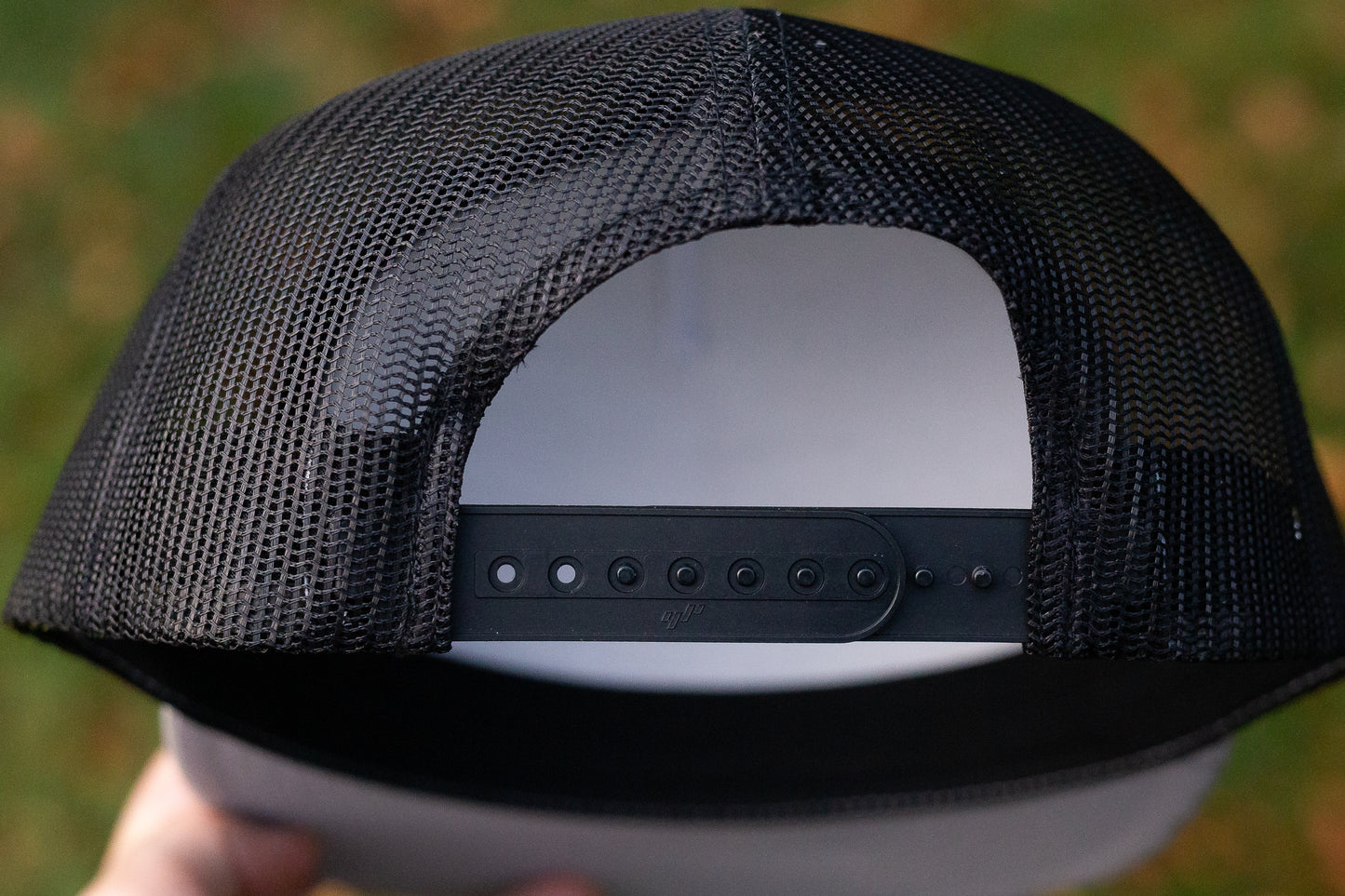 "MADE HERE, STAYED HERE" FLATBILL SNAPBACK TRUCKER HAT