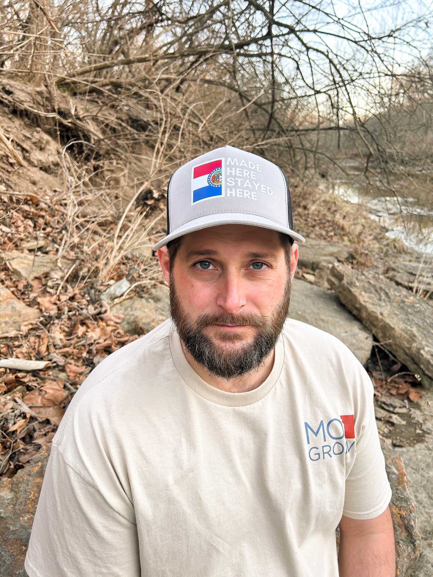 "MADE HERE, STAYED HERE" FLATBILL SNAPBACK TRUCKER HAT